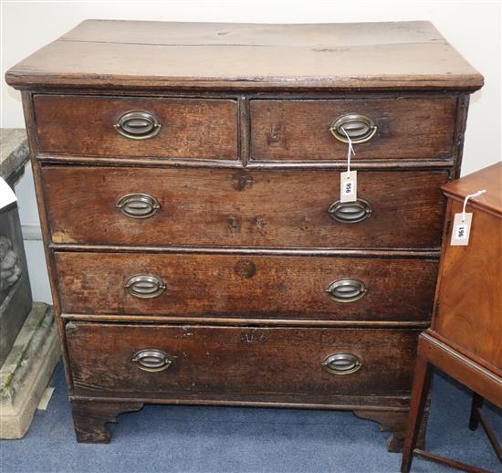 A mid 18th century oak chest W.95cm